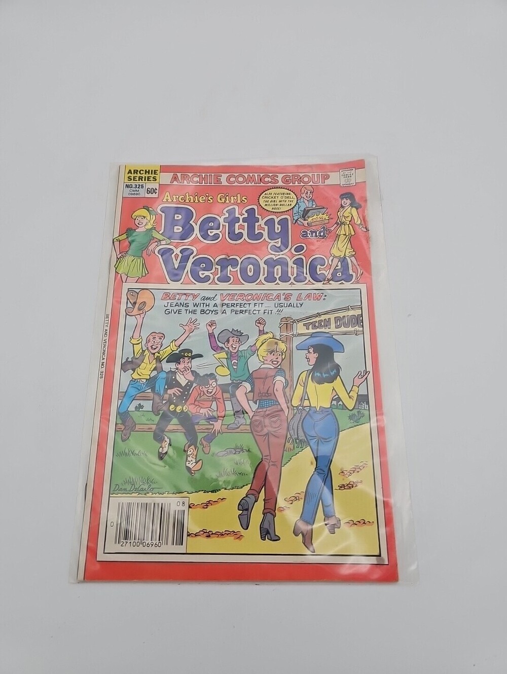 Vintage Feb 1984 Dan DeCarlo cover. Iconic "tight jeans" art. Condition #328